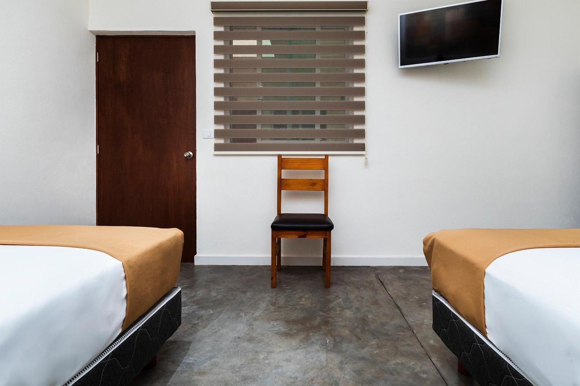 Capital O Hotel Joyma Suites, San Luis ซานหลุยส์โปโตซิ ภายนอก รูปภาพ