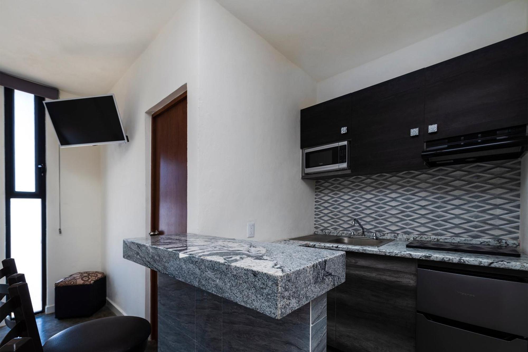 Capital O Hotel Joyma Suites, San Luis ซานหลุยส์โปโตซิ ภายนอก รูปภาพ